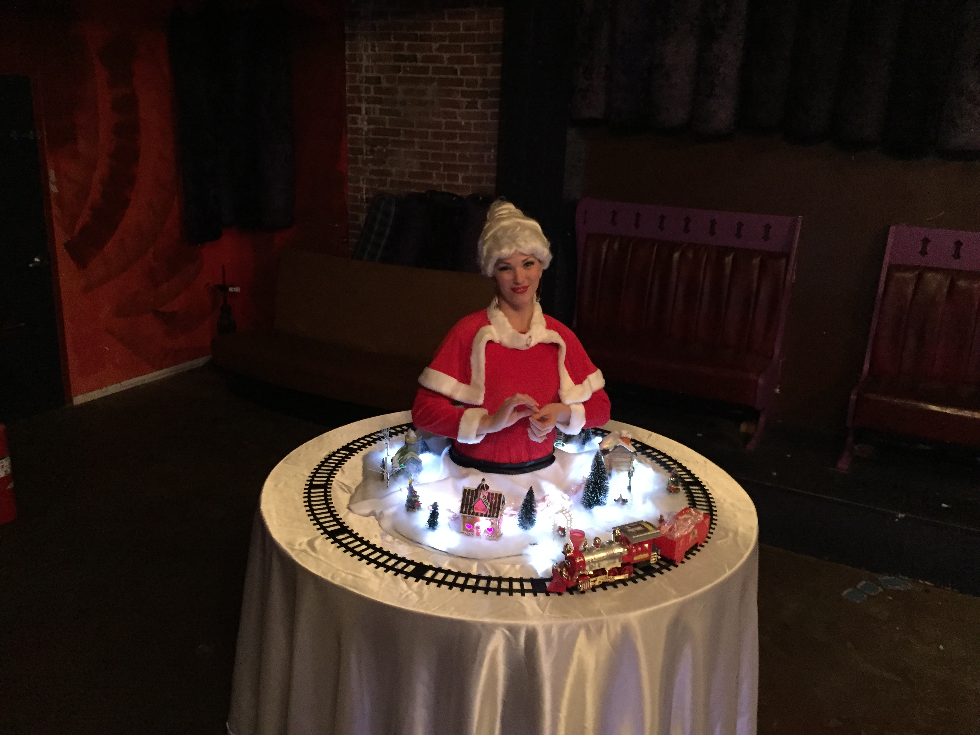 Mrs. Claus Christmas village strolling table