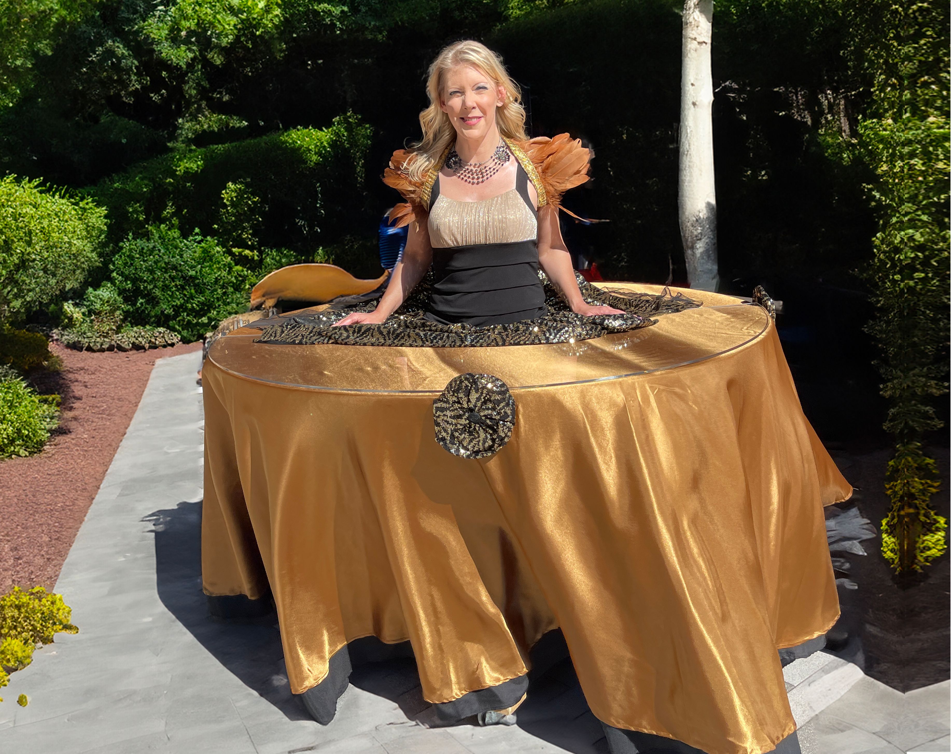 Beautiful strolling table on wheels Great Gatsby themed party in a park.