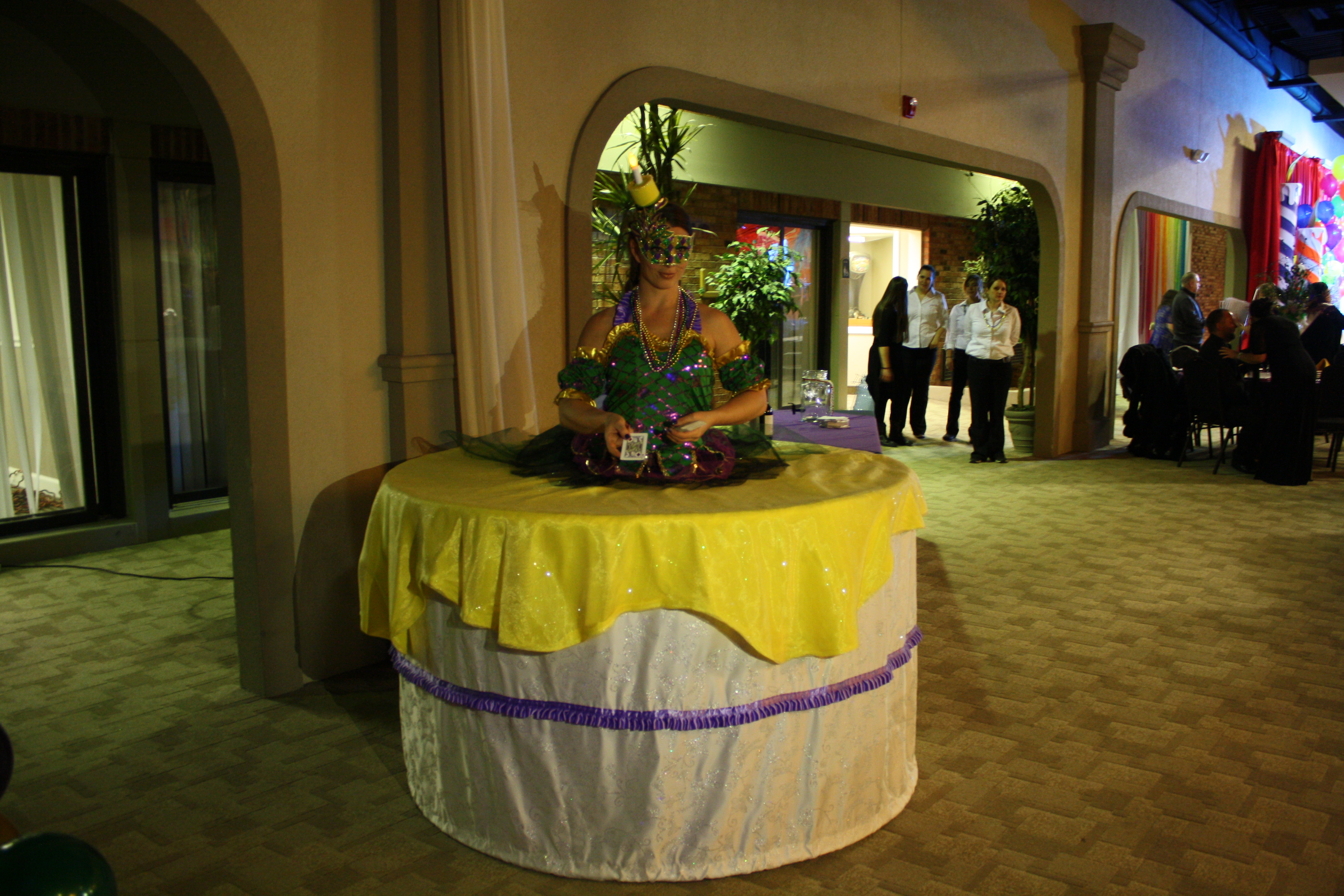 Mardi Gras king cake strolling table engages party guests