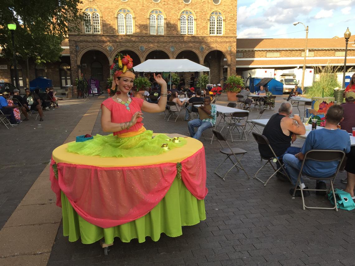 Fruit themed strolling table orange green yellow