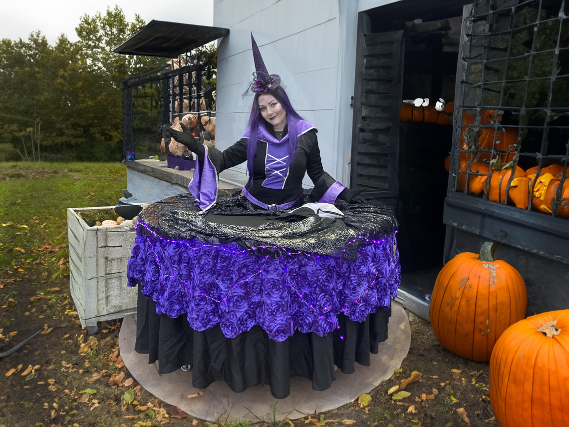 Witch strolling table for Halloween themed events in St. Louis Missouri.